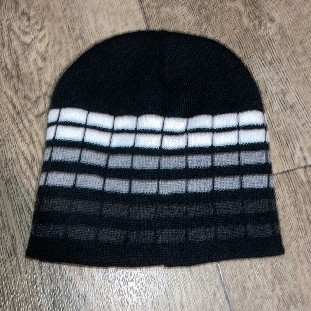 Black, white, and gray beanie, unbranded, used like new